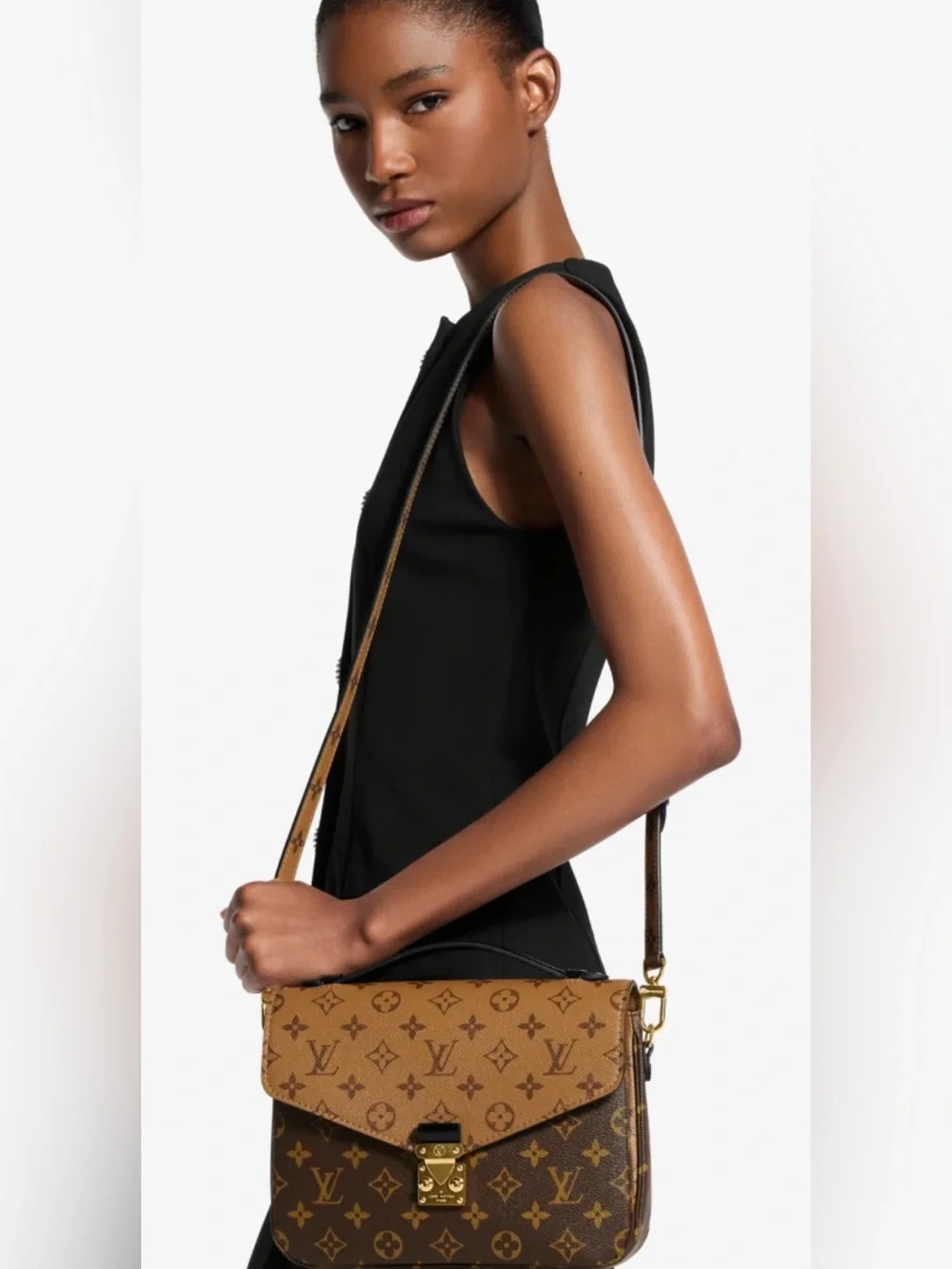 Authentic Louis Vuitton Reverse Métis Monogram Flap Crossbody Bag in Brown